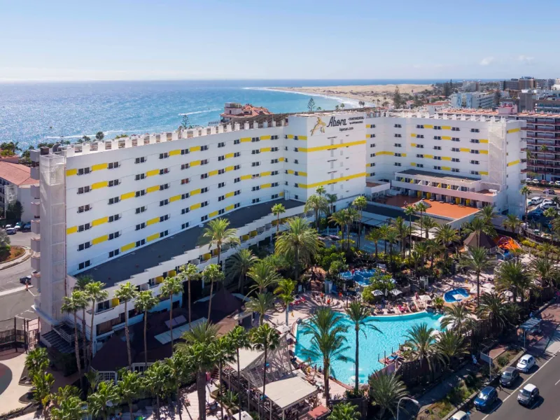 Aerial view of Abora Continental with its pool, the sea and the Maspalomas dunes