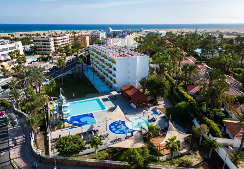 Aerial view of Abora Catarina with its pools, the waterpark and the sea in the background